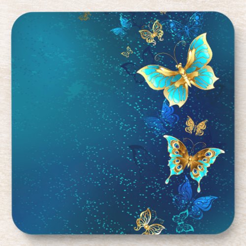 Golden Butterflies on a Blue Background Beverage Coaster