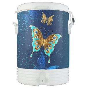 Golden Butterflies on a Blue Background Beverage Cooler
