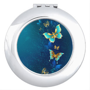 Golden Butterflies on a Blue Background Compact Mirror