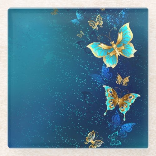 Golden Butterflies on a Blue Background Glass Coaster
