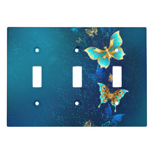 Golden Butterflies on a Blue Background Light Switch Cover