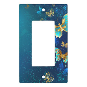 Golden Butterflies on a Blue Background Light Switch Cover