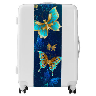 Golden Butterflies on a Blue Background Luggage