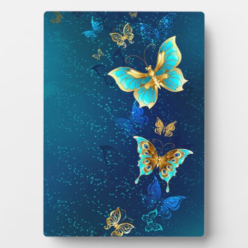 Golden Butterflies on a Blue Background Plaque