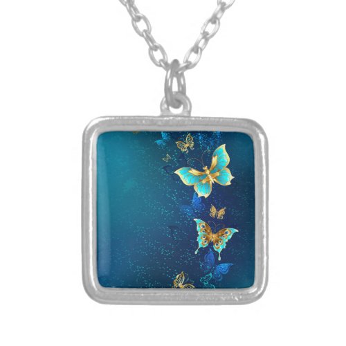 Golden Butterflies on a Blue Background Silver Plated Necklace