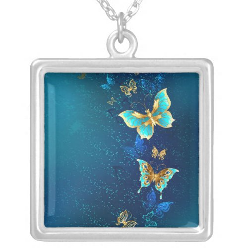 Golden Butterflies on a Blue Background Silver Plated Necklace