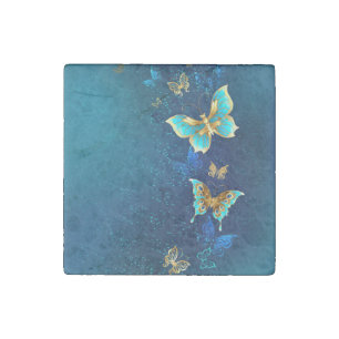 Golden Butterflies on a Blue Background Stone Magnet