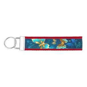 Golden Butterflies on a Blue Background Wrist Keychain