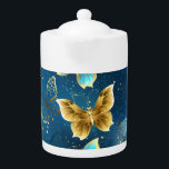 Golden butterflies teapot<br><div class="desc">Composition of flying,  jewelry,  gold and dark butterflies on textured jewelry background. Golden butterfly.</div>