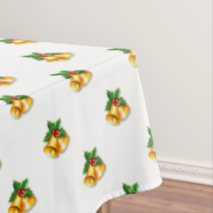 Golden Christmas Bells on White Tablecloth