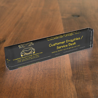 Golden classic luxury sports car logo on black desk name plate