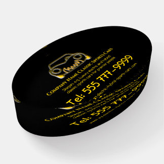 Golden classic luxury sports car logo on black paperweight