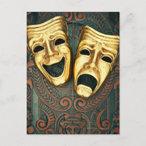 Golden comedy and tragedy masks on patterned postcard