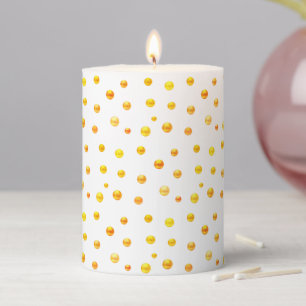 Golden Confetti on White Pillar Candle