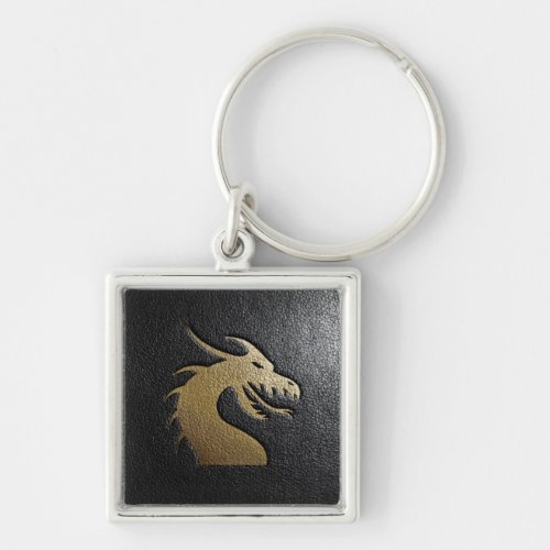 Golden dragon silhouette on black leather keychain