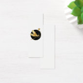 Golden dragonfly in black circle (Desk)
