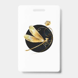 Golden dragonfly in black circle badge