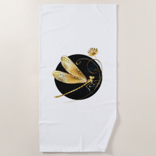Golden dragonfly in black circle beach towel