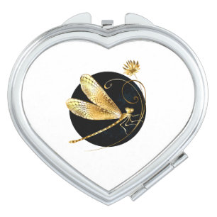 Golden dragonfly in black circle compact mirror