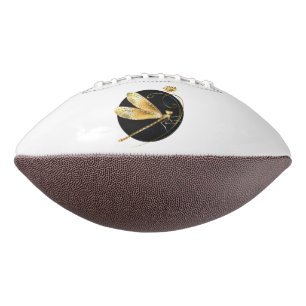 Golden dragonfly in black circle football