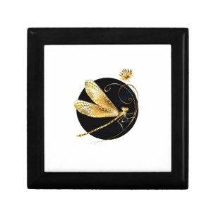 Golden dragonfly in black circle gift box