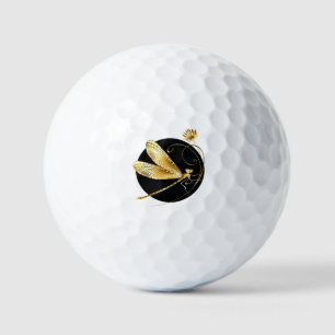 Golden dragonfly in black circle golf balls