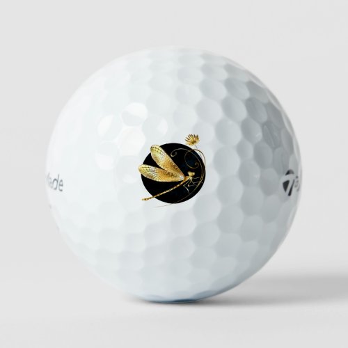 Golden dragonfly in black circle golf balls