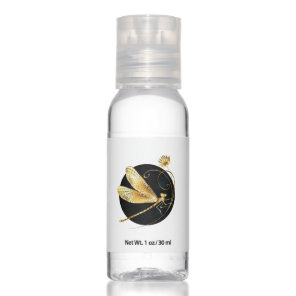 Golden dragonfly in black circle hand sanitizer