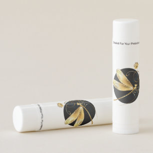 Golden dragonfly in black circle lip balm