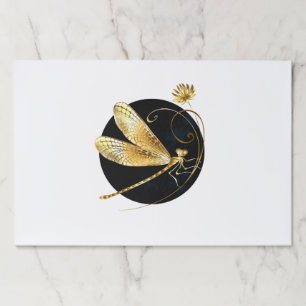 Golden dragonfly in black circle paper pad