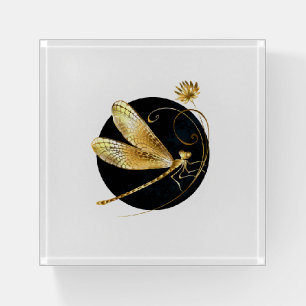 Golden dragonfly in black circle paperweight