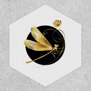 Golden dragonfly in black circle patch