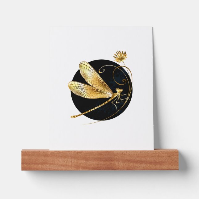 Golden dragonfly in black circle picture ledge (Front)
