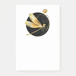 Golden dragonfly in black circle post-it notes