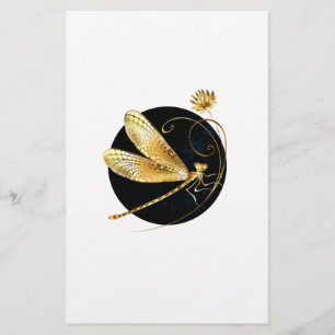 Golden dragonfly in black circle stationery