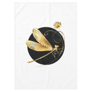 Golden dragonfly in black circle tablecloth