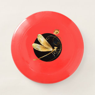 Golden dragonfly in black circle Wham-O frisbee