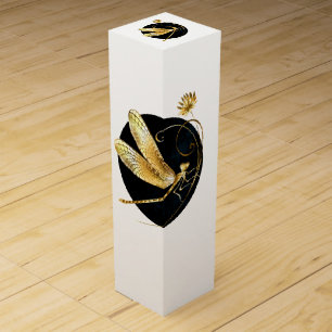 Golden dragonfly in black circle wine box