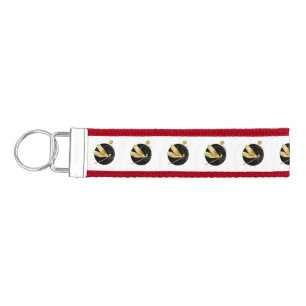 Golden dragonfly in black circle wrist keychain