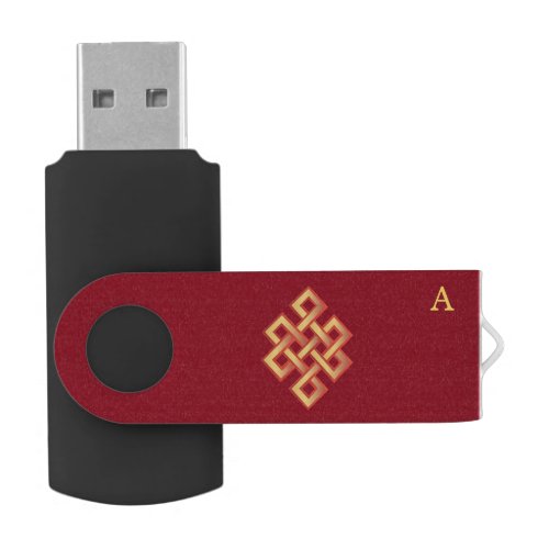 Golden endless knot on burgundy red flash drive