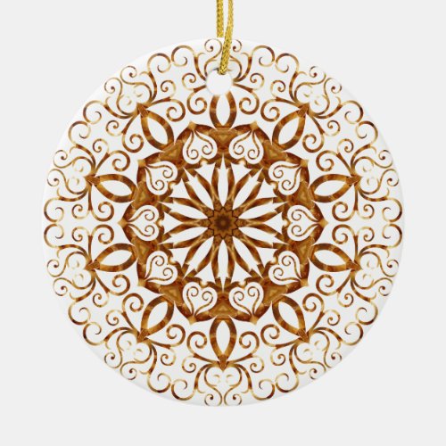 Golden filigree flake on white ceramic ornament