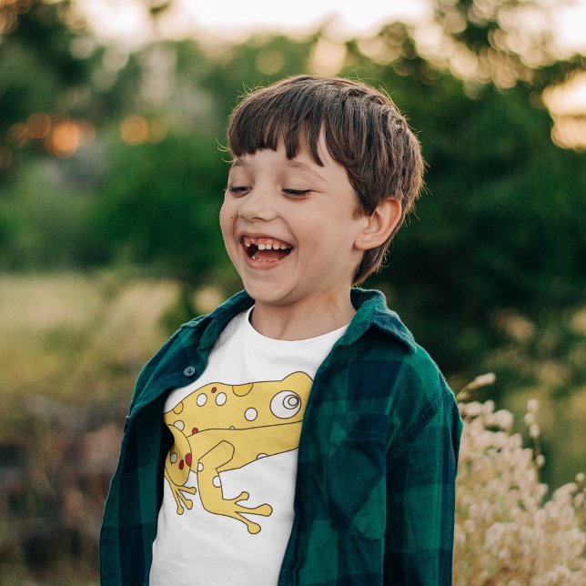 Golden Frog T-Shirt (Broken tooth kid smiling and posing in blue shirt over golden frog t-shirt  )