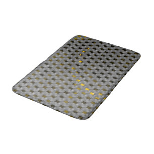 Golden image under grey plates, oblong squares bath mat