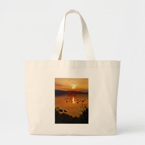 Golden lake sunset with geese large tote bag