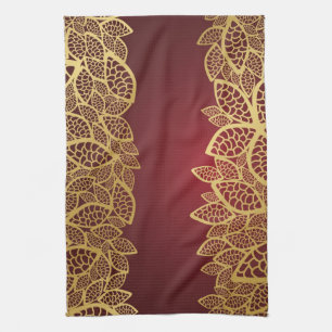 Golden leaf lace on red background towel