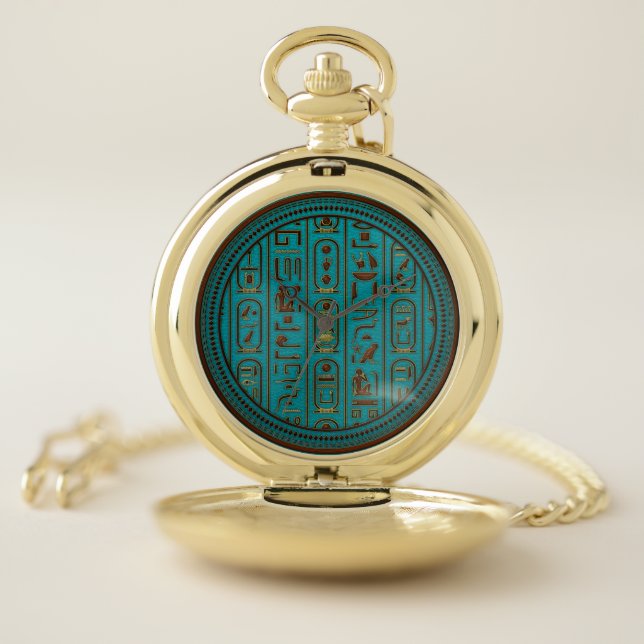 Golden Leather hieroglyphs embossed on teal Pocket Watch (Inside)