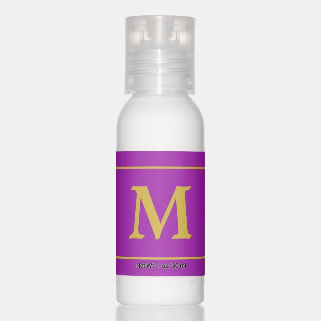 Golden monogram on royal purple hand lotion (Front)