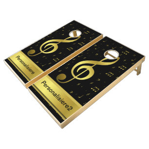golden music notes in black cornhole set