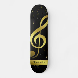 golden music notes in black skateboard deck