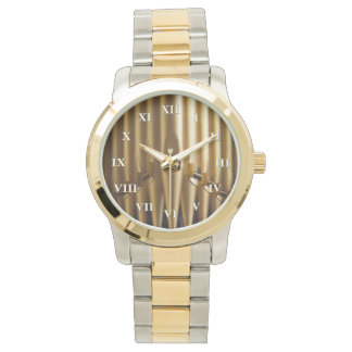 Golden organ pipes watch